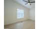 Bright bedroom with ceiling fan and wood-look flooring at 9144 E Balsam Ave, Mesa, AZ 85208