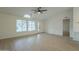 Spacious living room featuring hardwood floors and a ceiling fan at 9144 E Balsam Ave, Mesa, AZ 85208