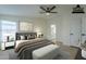 Virtually staged main bedroom with ensuite bathroom access at 9144 E Balsam Ave, Mesa, AZ 85208