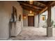 Covered patio with rustic wood beams and tile flooring at 9820 E Thompson Peak Pkwy # 646, Scottsdale, AZ 85255