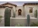 Spanish-style home with cacti and brick entryway at 9820 E Thompson Peak Pkwy # 646, Scottsdale, AZ 85255