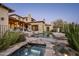 Resort-style pool and spa with a lush green lawn at 9820 E Thompson Peak Pkwy # 646, Scottsdale, AZ 85255