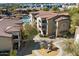 Birds eye view of the complex's apartment buildings, play area, and lush landscaping at 10136 E Southern Ave # 1045, Mesa, AZ 85209