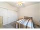 Cozy bedroom featuring natural light, neutral carpet, and a closet with sliding doors at 10136 E Southern Ave # 1045, Mesa, AZ 85209