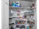 Organized pantry with ample shelving for food storage at 10136 E Southern Ave # 1045, Mesa, AZ 85209