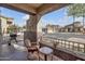 Relaxing patio with seating and grill, overlooking community at 10136 E Southern Ave # 1045, Mesa, AZ 85209