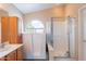 Main bathroom with walk-in shower, large vanity and walk in tub at 10512 E Dutchmans Trl, Gold Canyon, AZ 85118