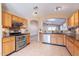 Spacious kitchen with stainless steel appliances and granite countertops at 10512 E Dutchmans Trl, Gold Canyon, AZ 85118