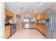 Modern kitchen featuring stainless steel appliances and ample cabinetry at 10512 E Dutchmans Trl, Gold Canyon, AZ 85118