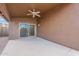 Covered patio with sliding door access, creating an outdoor oasis at 10512 E Dutchmans Trl, Gold Canyon, AZ 85118