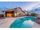 Stunning pool with a covered patio, overlooking the backyard at 10512 E Dutchmans Trl, Gold Canyon, AZ 85118