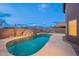 Inviting kidney-shaped pool with a waterfall feature, mountain views at 10512 E Dutchmans Trl, Gold Canyon, AZ 85118