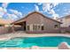 Home with inviting pool and relaxing patio area, perfect for entertaining at 10512 E Dutchmans Trl, Gold Canyon, AZ 85118