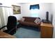 Small office or den with a futon and workspace at 106 S 72Nd Way, Mesa, AZ 85208