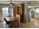 Casual dining area with wood hutch and view into kitchen at 10618 N 27Th St, Phoenix, AZ 85028