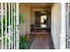 Front entry with decorative gates and tile flooring at 10618 N 27Th St, Phoenix, AZ 85028