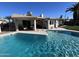 Inviting kidney-shaped pool with spacious patio at 10618 N 27Th St, Phoenix, AZ 85028