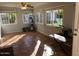 Sunroom with terracotta tile floor and ample natural light at 10618 N 27Th St, Phoenix, AZ 85028