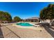 Enjoy this refreshing pool with diving board, and citrus trees at 11009 W Crestbrook Dr, Sun City, AZ 85351