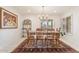 Bright dining room with neutral paint, tile floors, a window, and a decorative rug at 11802 S Half Moon Dr, Phoenix, AZ 85044