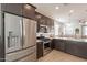 Modern kitchen with stainless steel appliances and island at 12246 E Pivot Peak E --, Gold Canyon, AZ 85118