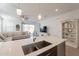 Modern kitchen with a large island and stainless steel sink at 12246 E Pivot Peak E --, Gold Canyon, AZ 85118