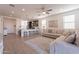 Open concept living room with kitchen and breakfast bar visible at 12246 E Pivot Peak E --, Gold Canyon, AZ 85118