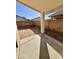 A simple backyard with a concrete patio and space for landscaping at 12367 W Woodland Ave, Avondale, AZ 85323