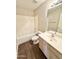 Clean bathroom with tub, toilet and vanity at 12367 W Woodland Ave, Avondale, AZ 85323