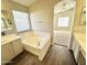 Large bathroom with a garden tub and double vanity at 12367 W Woodland Ave, Avondale, AZ 85323