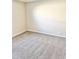 Spacious carpeted bedroom with neutral walls and ample closet space at 12367 W Woodland Ave, Avondale, AZ 85323