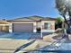 Ranch-style home with a two-car garage at 12367 W Woodland Ave, Avondale, AZ 85323