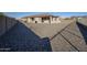 Large backyard with gravel and a view of the mountains at 12474 E Soloman Rd, Gold Canyon, AZ 85118