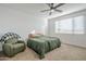 Bright bedroom with ceiling fan and large window at 12474 E Soloman Rd, Gold Canyon, AZ 85118