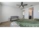 Bedroom with crib and ensuite bathroom access at 12474 E Soloman Rd, Gold Canyon, AZ 85118