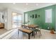 Bright dining area with sliding doors leading to backyard at 12474 E Soloman Rd, Gold Canyon, AZ 85118