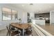 Dining area with kitchen view and natural light at 12474 E Soloman Rd, Gold Canyon, AZ 85118