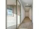 Long hallway with tile floors and access to backyard at 12474 E Soloman Rd, Gold Canyon, AZ 85118