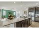 Modern kitchen with island and stainless steel appliances at 12474 E Soloman Rd, Gold Canyon, AZ 85118