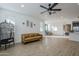 Open concept living area with tile floors and a view to the kitchen at 12474 E Soloman Rd, Gold Canyon, AZ 85118