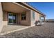 Covered patio with adjacent backyard and grill at 12474 E Soloman Rd, Gold Canyon, AZ 85118