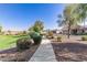 Landscaped community walkway with homes visible at 12808 N 144Th Dr, Surprise, AZ 85379