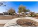 Community walking path with landscaping and homes at 12808 N 144Th Dr, Surprise, AZ 85379