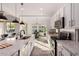 Bright kitchen with white cabinets and expansive countertops at 12808 N 144Th Dr, Surprise, AZ 85379