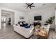 Living room with a view of entryway and wood-look floors at 12808 N 144Th Dr, Surprise, AZ 85379