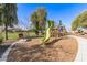 playground with a green slide and wood chips at 12808 N 144Th Dr, Surprise, AZ 85379