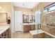 Spa-like bathroom with a large shower, double vanity, and modern fixtures at 12975 W Andrew Ln, Peoria, AZ 85383