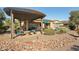 Wonderful patio with pergola, fire pit, and comfortable seating at 12975 W Andrew Ln, Peoria, AZ 85383