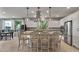 Bright, modern kitchen featuring a large island with pendant lighting and stainless steel appliances at 1364 E Elysian Pass, Queen Creek, AZ 85140