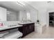 Elegant bathroom with soaking tub and double vanity at 13713 W Harvest Ave, Litchfield Park, AZ 85340